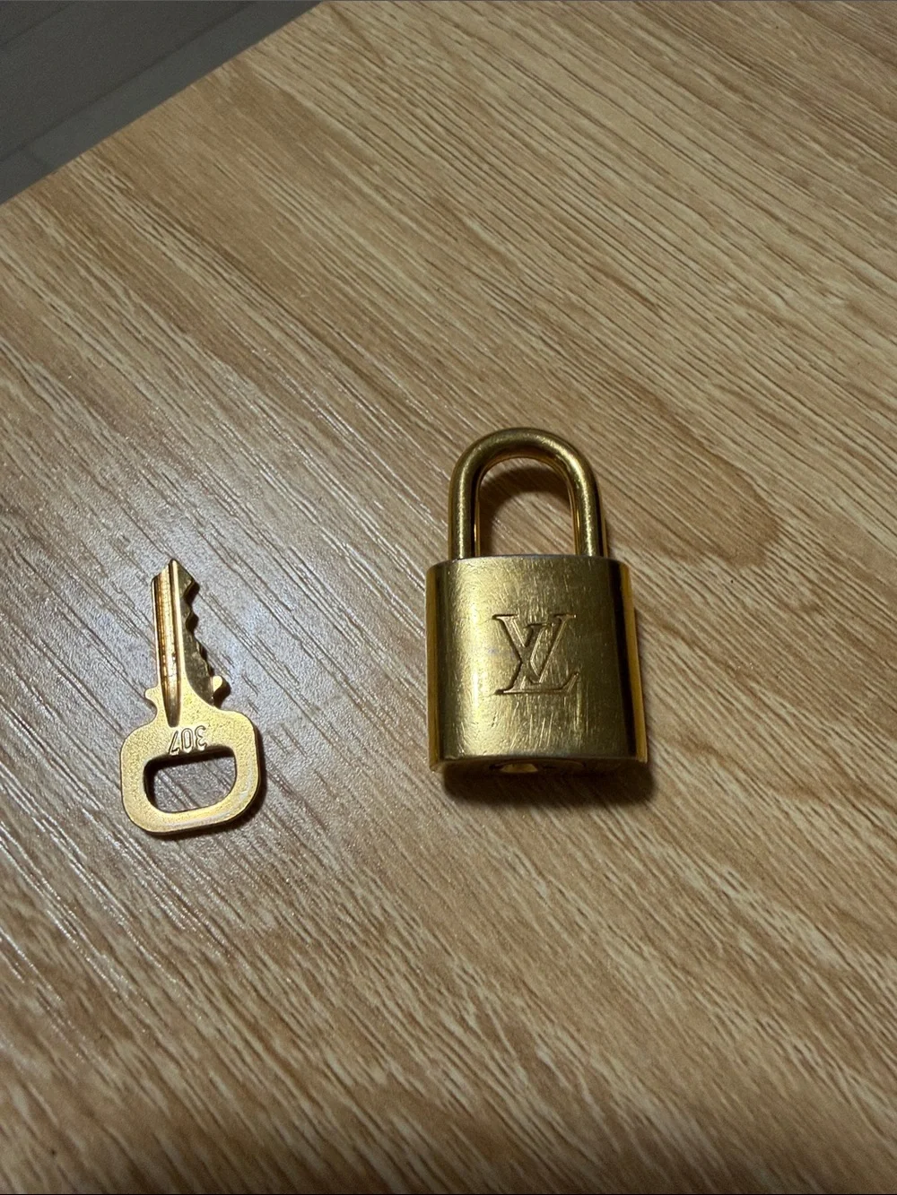 Louis Vuitton Gold Padlock Keyed Accessory
